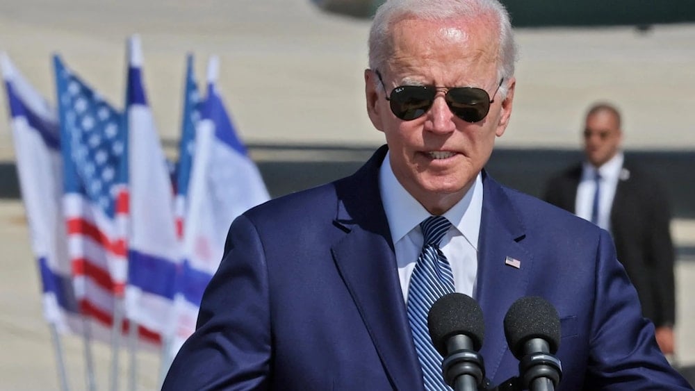 Joe Biden delivers a statement upon arrival at Israel's Ben Gurion Airport near Tel Aviv, on July 13, 2022. (AFP via Getty Images)