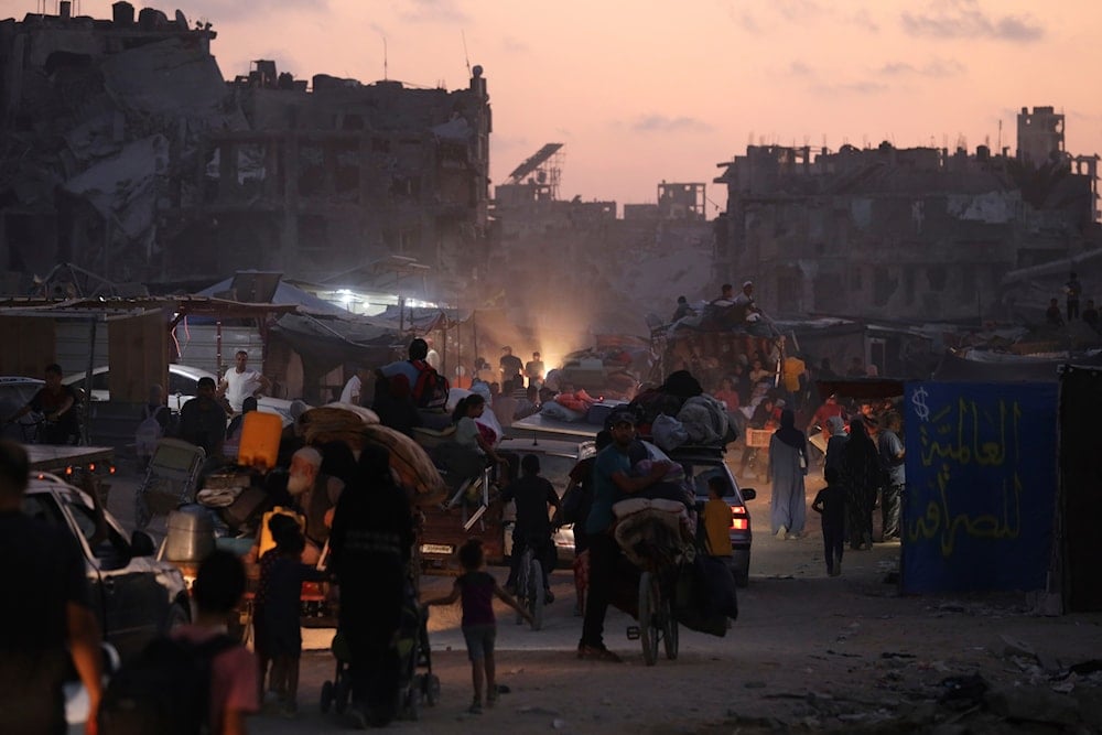 Palestinians displaced by the Israeli air and ground offensive on the Gaza Strip flee from parts of Khan Younis following an evacuation order by the Israeli occupation forces, July 1, 2024 (AP)