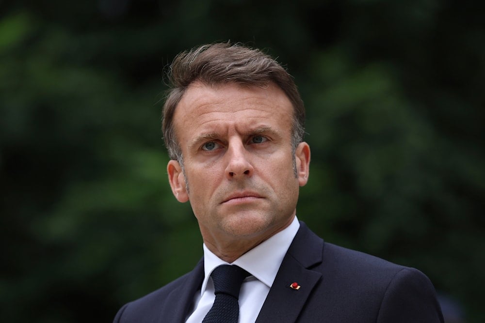 French President Emmanuel Macron reviews troops that will take part to the Bastille Day parade, Tuesday, July 2, 2024 in Paris (AP)