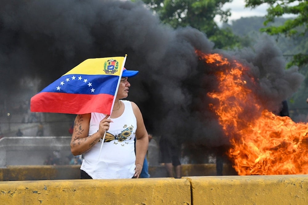 Protesters demonstrate against the official election results declaring President Nicolas Maduro's reelection, the day after the vote in Valencia, Venezuela, Monday, July 29, 2024. (AP)