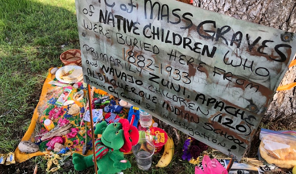 A makeshift memorial to the dozens of Indigenous children who died while attending boarding school is pictured under a tree at a public park in Albuquerque, New Mexico, on July 1, 2021. (AP)