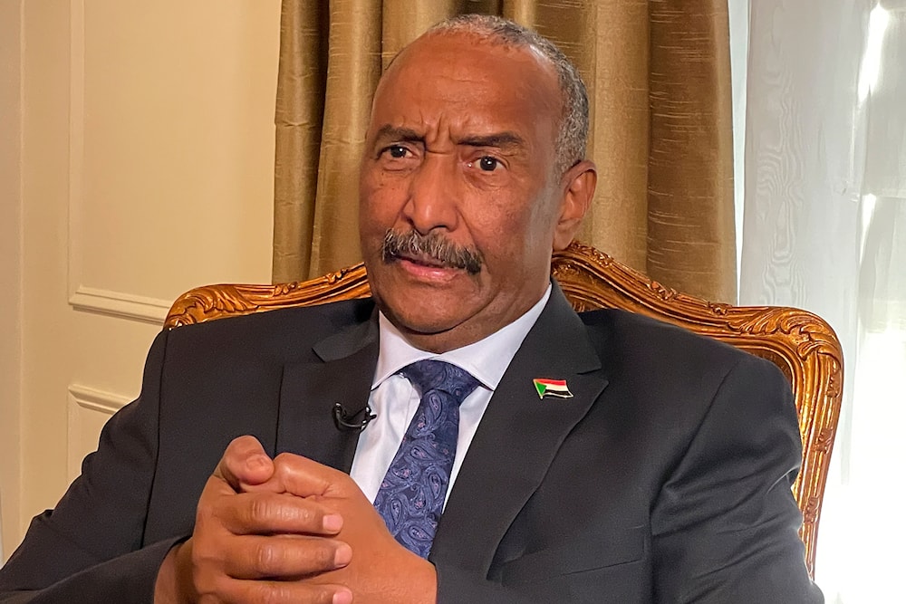 Sudan's General Abdel Fattah al-Burhan, answers questions during an interview, on September 22, 2022. (AP)