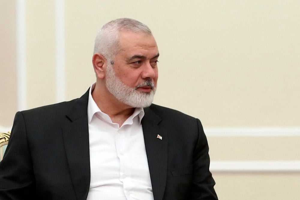 In this photo released by the Iranian Presidency Office, Hamas chief Ismail Haniyeh sits in a meeting with President Masoud Pezeshkian at the presidency office in Tehran, Iran, Tuesday, July 30, 2024 (AP)