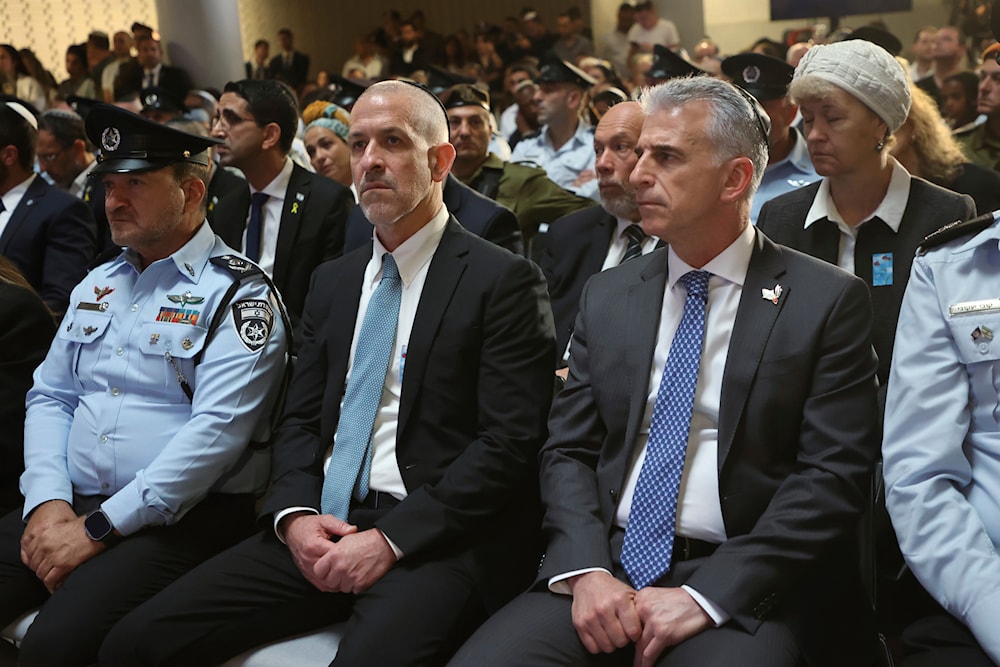 Mossad intelligence agency chief David Barnea, front right, attends a ceremony at the Mount Herzl military cemetery in occupied al-Quds, occupied Palestine, May 13, 2024 (AP)