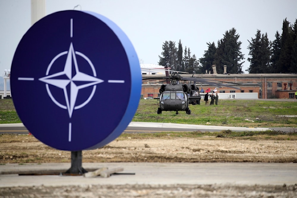 Military helicopters are parked at an airbase in Kocuve, about 85 kilometers (52 miles) south of Tirana, Albania, Monday, March 4, 2024. (AP)