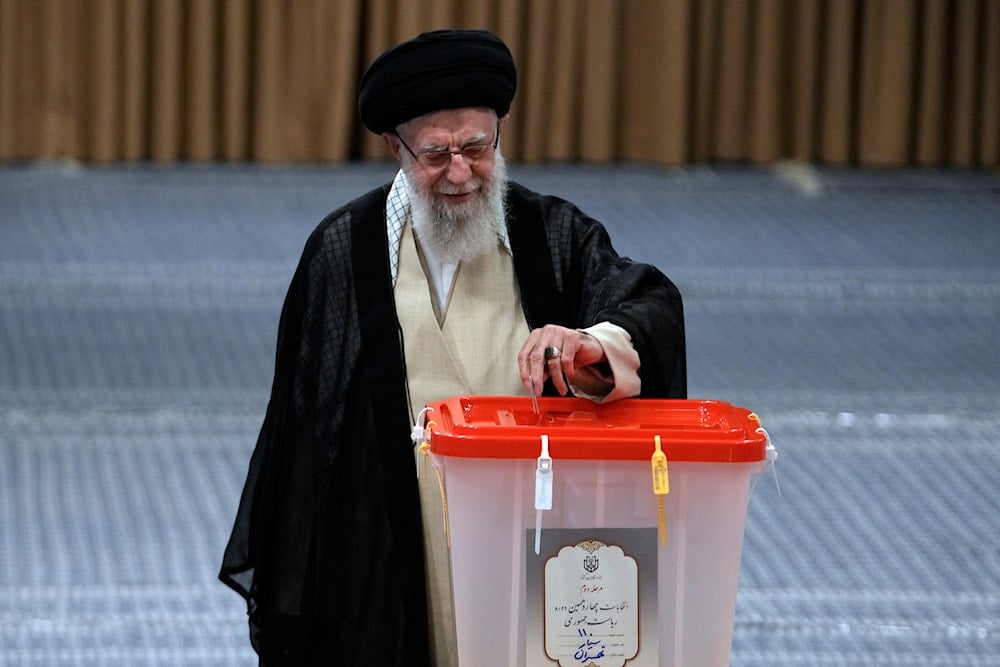 Iranian Supreme Leader Ayatollah Ali Khamenei casts his vote for the presidential runoff election in Tehran, Iran, on July 5, 2024. (AP)