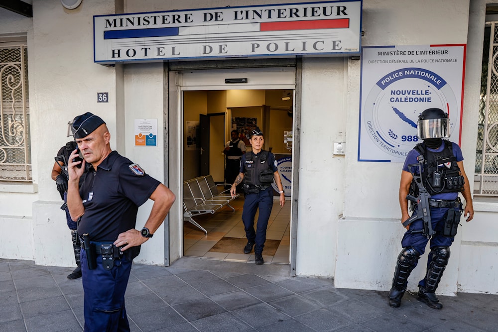 Police wait for the arrival of French President Emmanuel Macron at the central police station in Noumea, New Caledonia, Thursday, May 23, 2024. (AP)