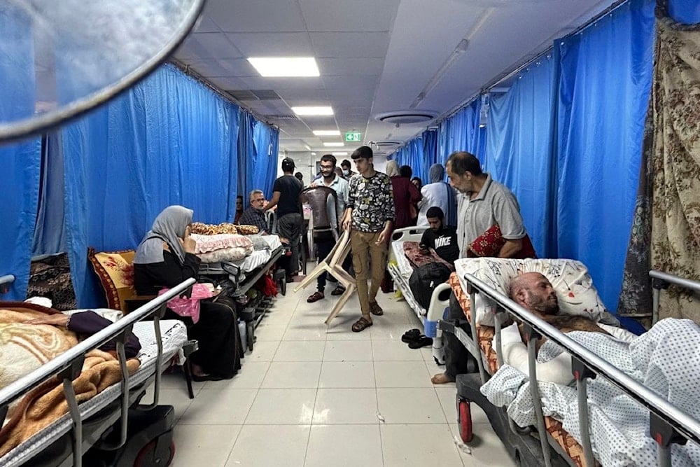 Patients and forcibly displaced people at Al-Shifa hospital in Gaza City on November 10 amid Israeli genocide (AFP)