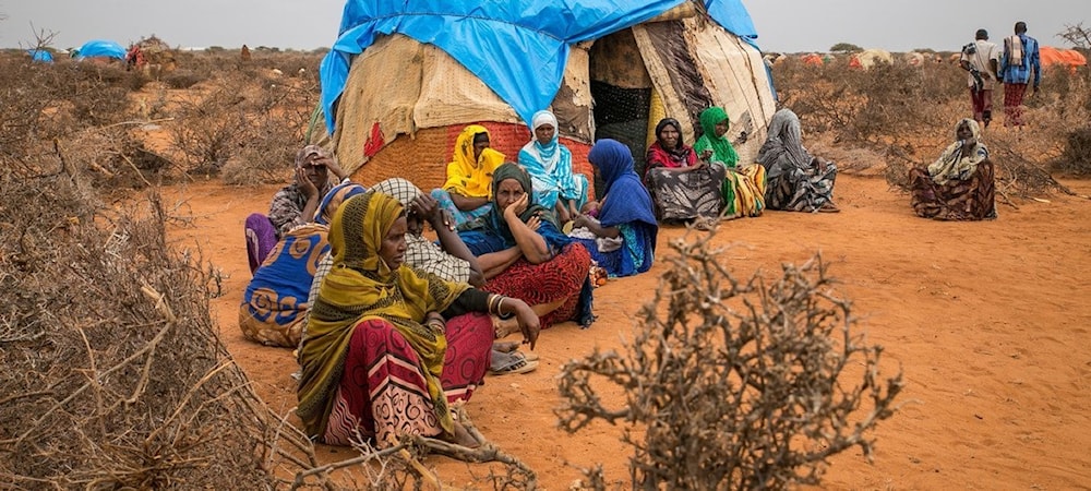 Ethiopian women moved to temporary sites close to permanent water point, as drought affected Ethiopia Somali region. (UNOCHA)