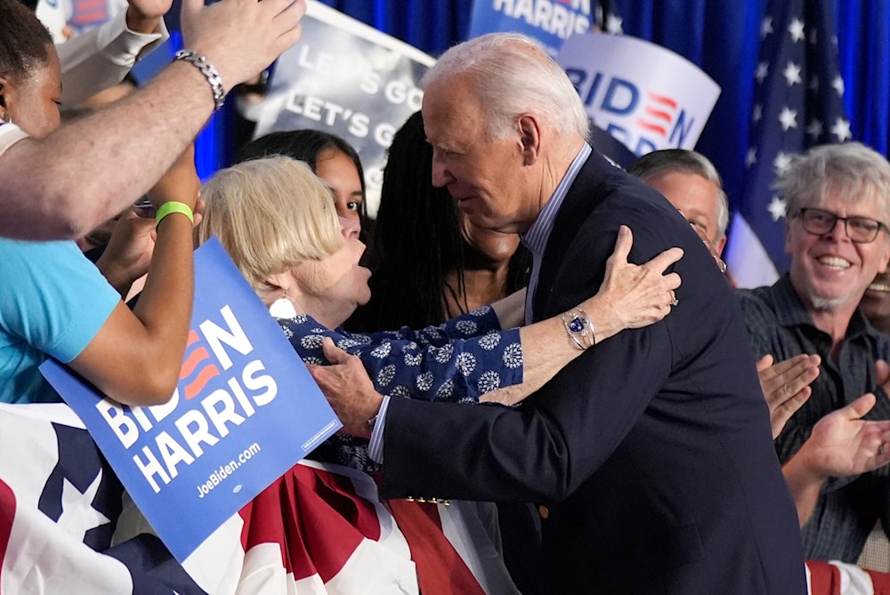 President Joe Biden, right, greets supporters at a campaign rally at Sherman Middle School in Madison, Wisconsin, Friday, July 5, 2024. (AP)