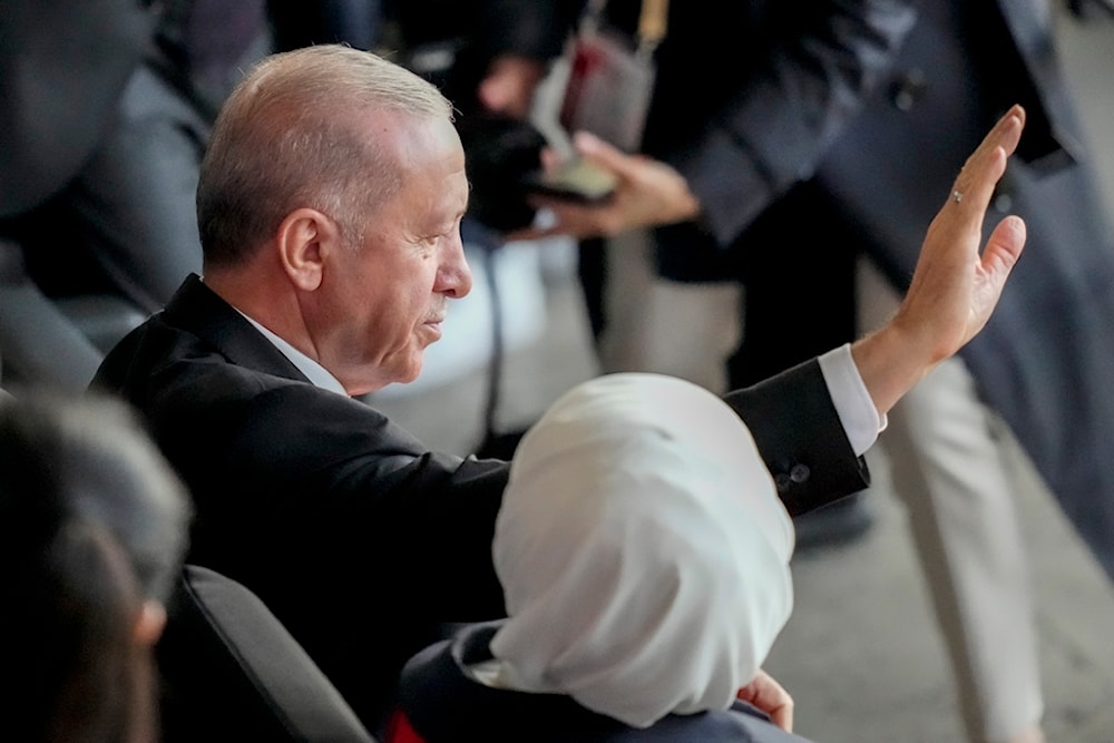 Turkish President Recep Tayyip Erdogan waves prior the start the quarterfinal match between the Netherlands and Turkey at the Euro 2024 soccer tournament in Berlin, Germany, July 6, 2024. (AP)