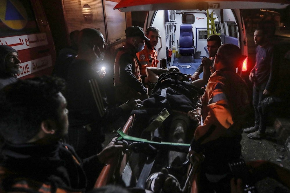 Palestinian medics evacuate a wounded youth after Israeli bombardment of the Gaza Strip, by ambulance to the Hospital in Rafah, southern Gaza Strip, occupied Palestine, May 4, 2024 (AP)