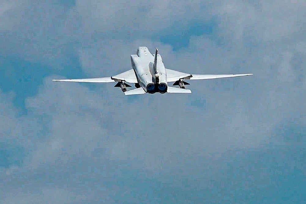 In this photo taken from video on Monday, June 10, 2024, and released by the Russian Defense Ministry Press Service, A Russian Tu-22M3 bomber is seen in flight during joint Russian-Belarusian drills. (AP)