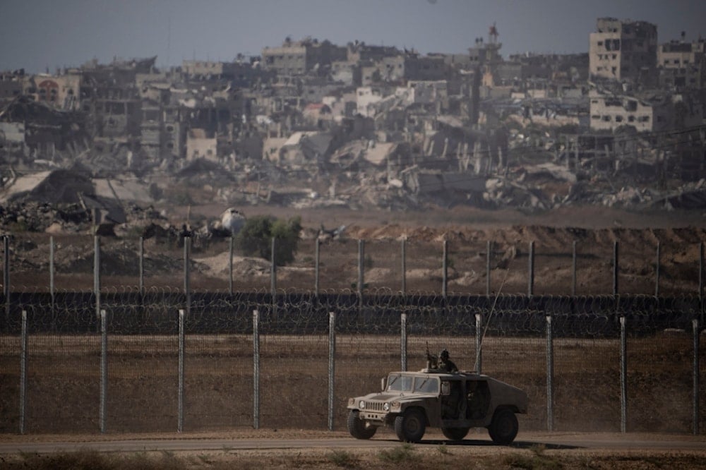 Israeli soldiers move near the separation line with Gaza, Palestine, Monday, July 8, 2024. (AP)