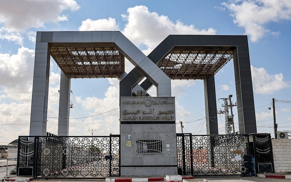 This picture taken on October 19, 2023 shows the closed gate to the Rafah border crossing with Egypt, in the southern Gaza Strip. (AFP)