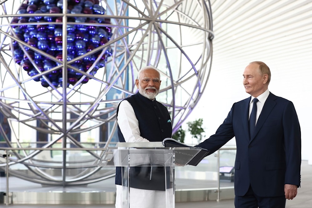 Indian Prime Minister Narendra Modi, left, and Russian President Vladimir Putin visit Atom pavilion at the Exhibition of Achievements of National Economy in Moscow, Russia, July 9, 2024. (AP)