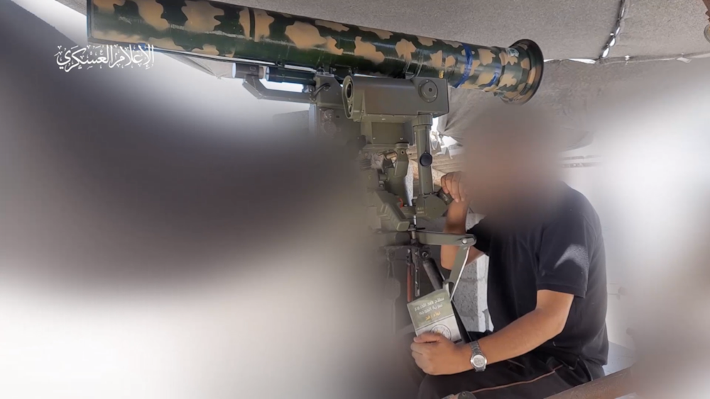 Al-Qassam release footage destroying Israeli Namer APC with Red Arrow