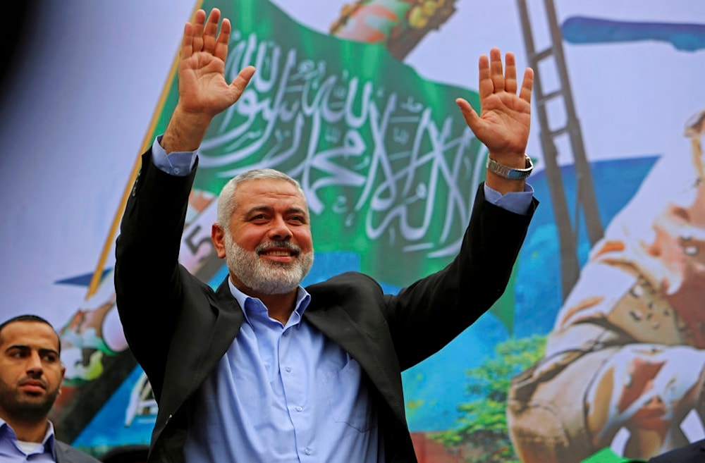 In this Dec. 12, 2014 file photo, Palestinian top Hamas leader Ismail Haniyeh greets supporters during a rally to commemorate the 27th anniversary of Hamas, in the northern Gaza Strip. (AP)