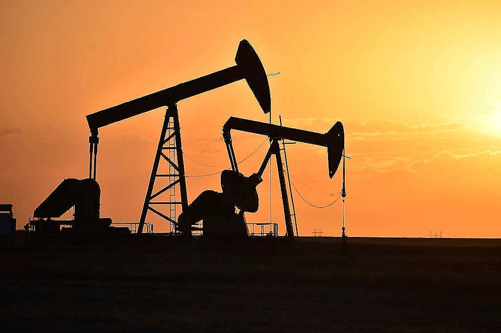 Pump jacks extract oil from beneath the ground in North Dakota, May 19, 2021. (AP)