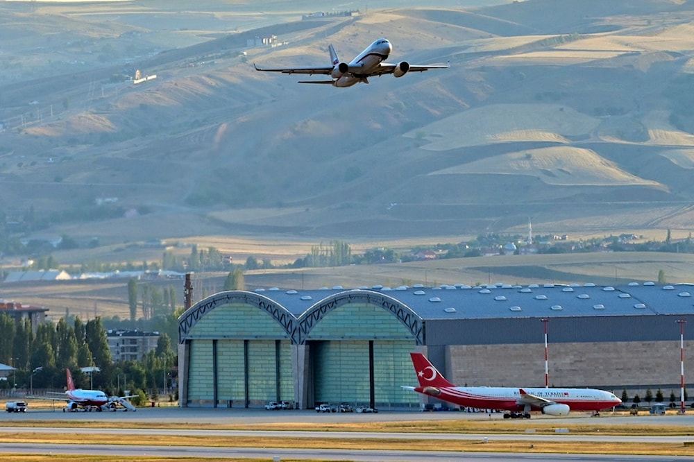 A Russian Plane, believed to be carrying released Russian prisoners, leaves the Ankara Airport, Turkey, Thursday, Aug. 1, 2024. (AP Photo)