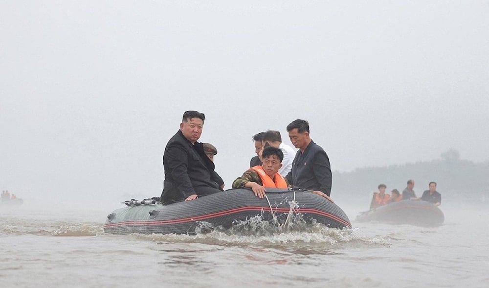 DPRK leader Kim Jong Un and Premier Kim Tok Hun visit a flood-affected area near the border with China, in North Pyongan Province, North Korea, July 31, 2024. (KCNA)