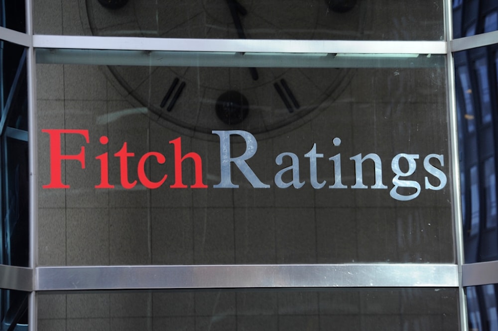 This photo shows signage for Fitch Ratings, Sunday, Oct. 9, 2011, in New York. (AP)