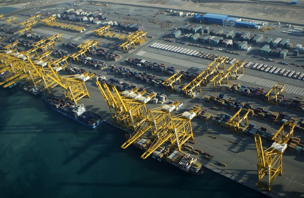 Container ships dock at the Dubai Port in the Jebel Ali Free Zone about 40 kilometers (25 miles) south of Dubai, United Arab Emirates Jan. 3, 2010. (AP Photo/Kamran Jebreili, File)