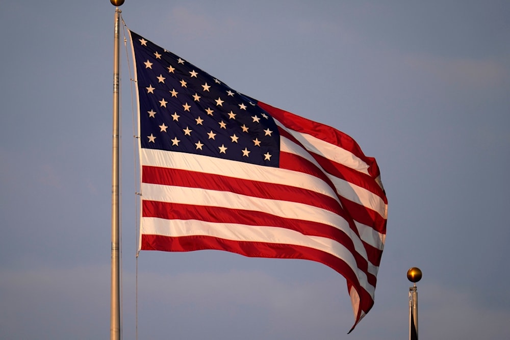 An American flag flies over PNC Park during a baseball game between the Pittsburgh Pirates and the New York Mets in Pittsburgh, Friday, June 9, 2023. (AP Photo/Gene J. Puskar)