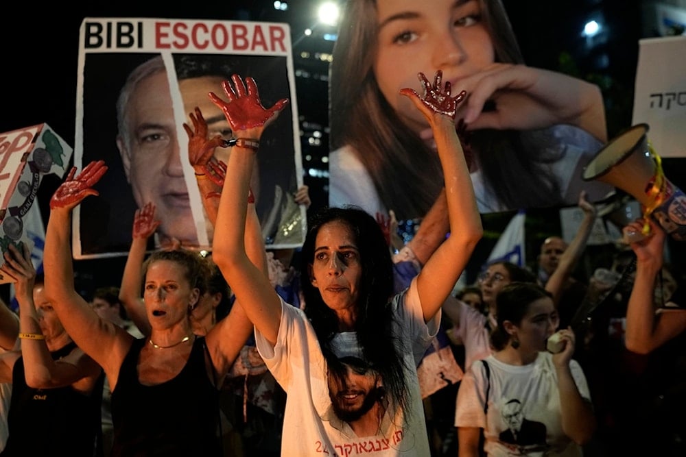 Israeli settler families of captives held in the Gaza Strip and allies protest against Israeli Prime Minister Benjamin Netanyahu's government in Tel Aviv, 'Israel', Saturday, Aug. 17, 2024. (AP(