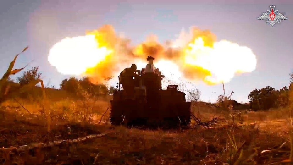 In this photo taken from a video released by the Russian Defense Ministry on Sunday, August 18, 2024, Russian soldiers fire Giatsint-S self-propelled gun toward Ukrainian positions in the Russian-Ukrainian border area in the Kursk region, Russia (AP)