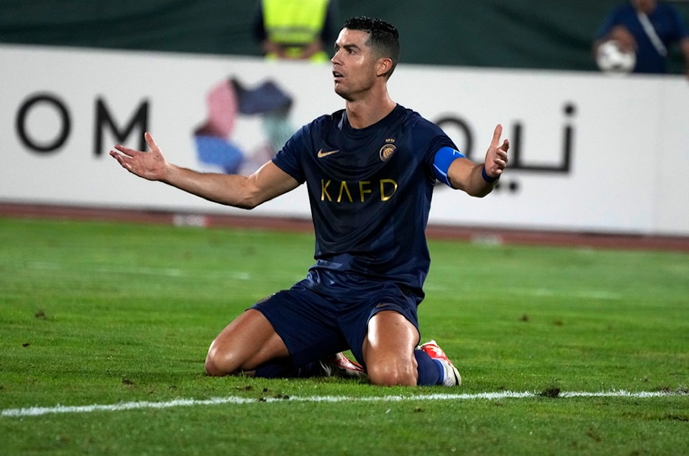 Saudi Arabia's Al Nassr Cristiano Ronaldo reacts in a match with Iran's Persepolis during their AFC Champions League soccer match at the Azadi Stadium in Tehran, Iran, Tuesday, Sept. 19, 2023. (AP)