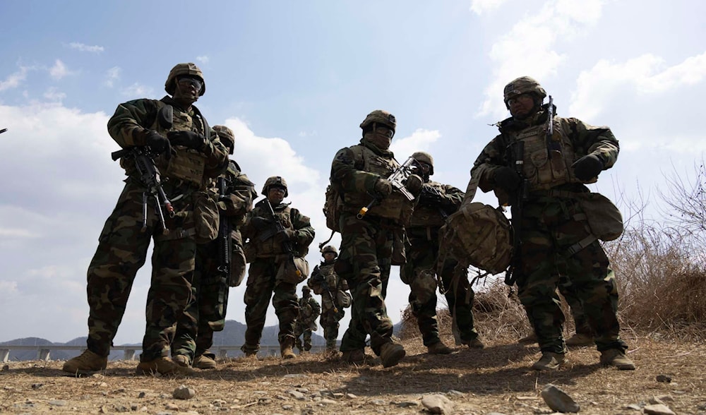 South Korean and US soldiers conducted a joint river-crossing exercise in Yeoncheon, Gyeonggi province, on March 20, 2024. (AFP)