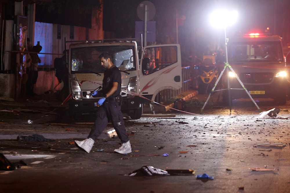 Israeli police work at the scene of a bomb explosion in Tel Aviv, Sunday, Aug. 18, 2024. (AP)