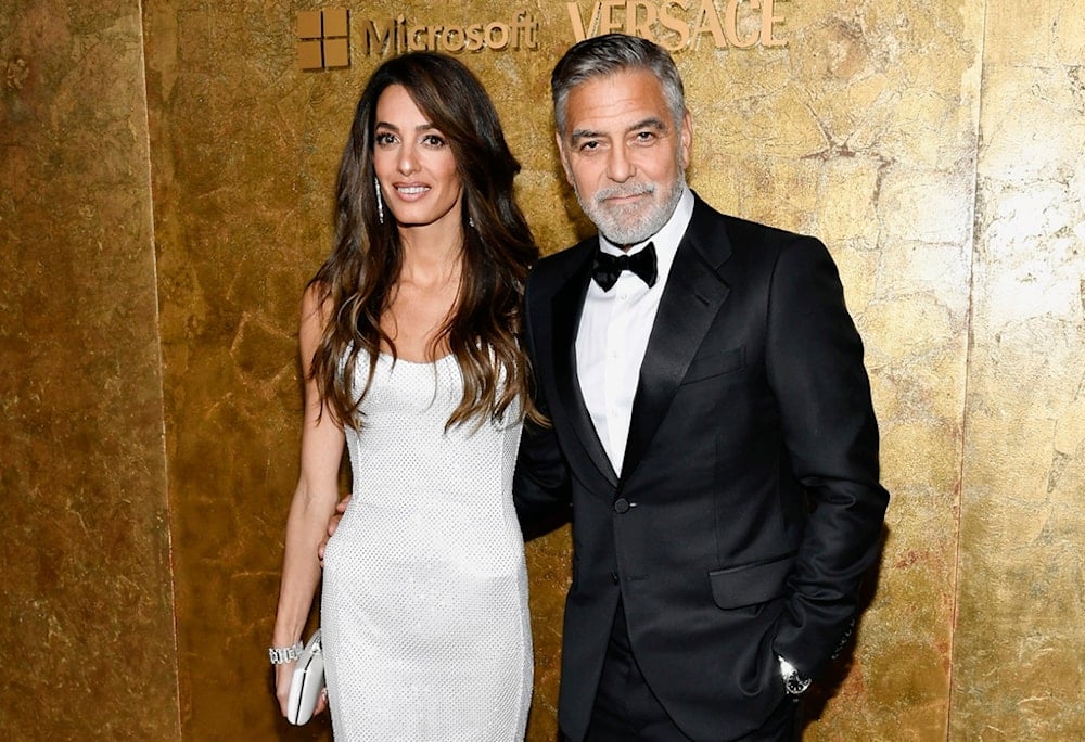 George Clooney, right, and Amal Clooney attend The Albies hosted by the Clooney Foundation for Justice at the New York Public Library on Thursday, Sept. 28, 2023, in New York. (AP)