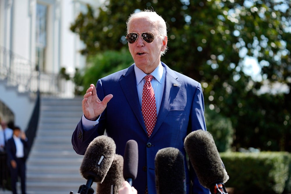 US President Joe Biden speaks to reporters before boarding Marine One on the South Lawn of the White House, Friday, August 2, 2024, in Washington, en route to Wilmington, Delaware (AP)