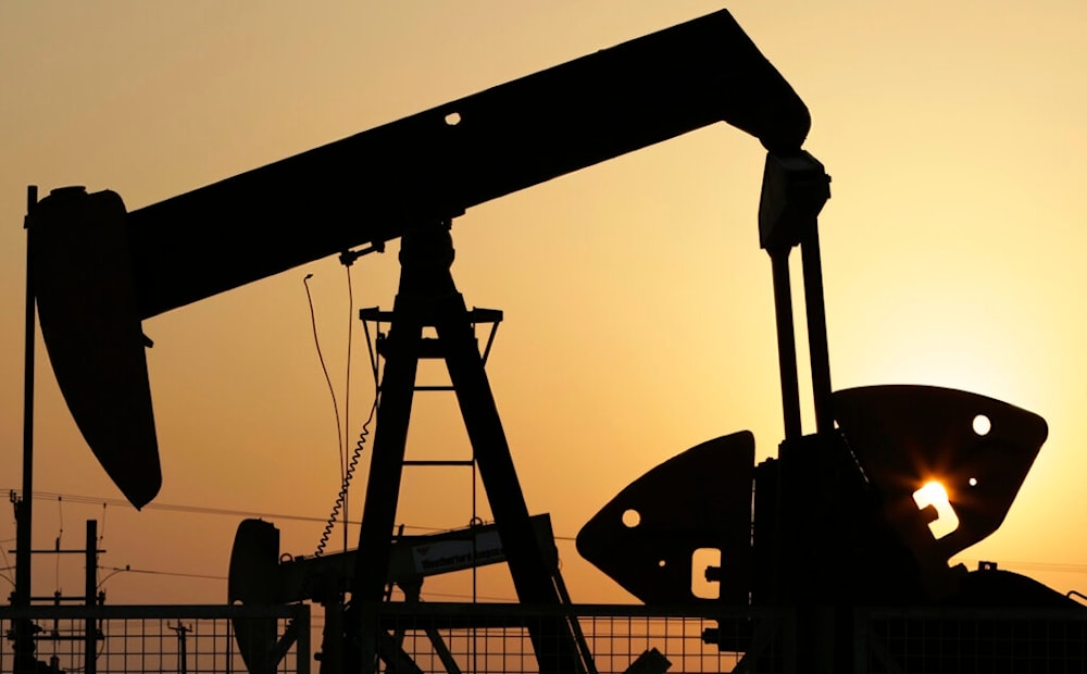 In this Sept. 30, 2015, file photo, oil pumps work in the desert oil fields of Sakhir, Bahrain. (AP)