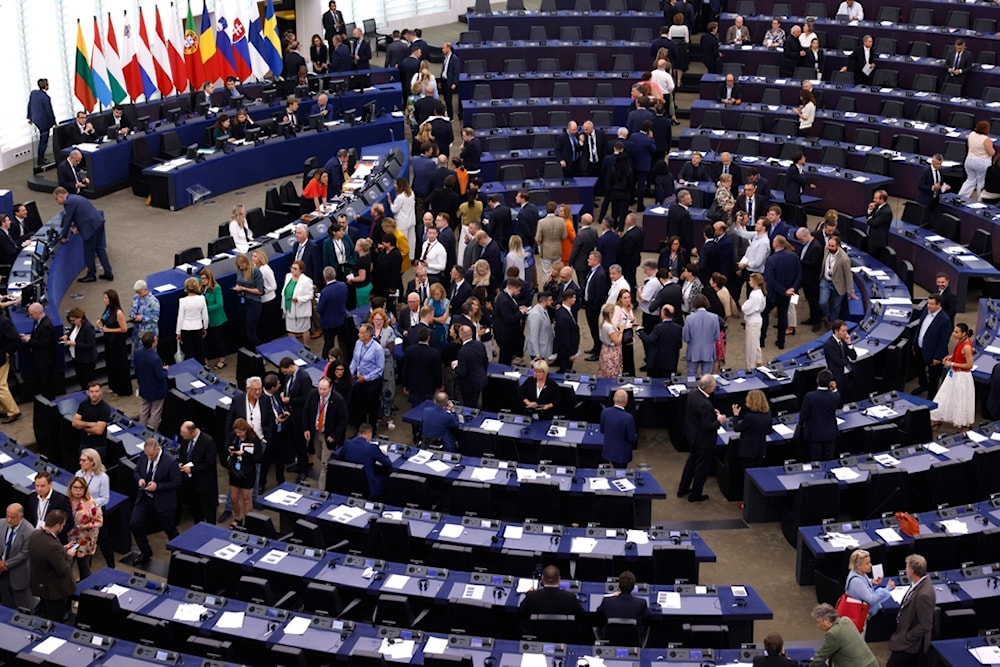 Members of European Parliament enter the plenary chamber as they prepare to vote at the European Parliament in Strasbourg, eastern France, Thursday, July 18, 2024. (AP)