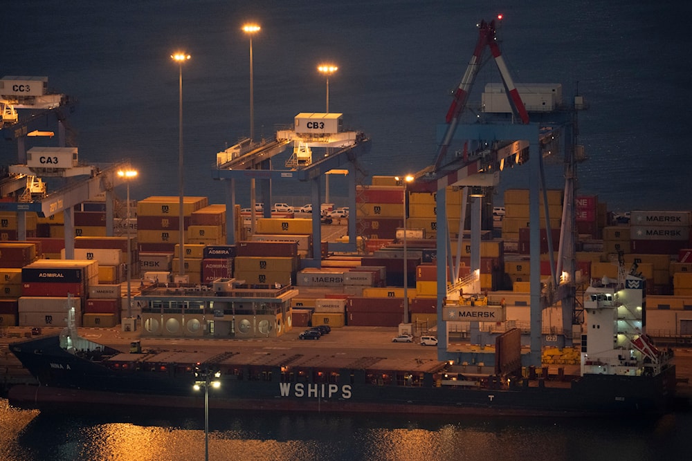 A cargo ship is seen docked at a containers terminal in the port of Haifa, Aug. 15, 2024. (AP)