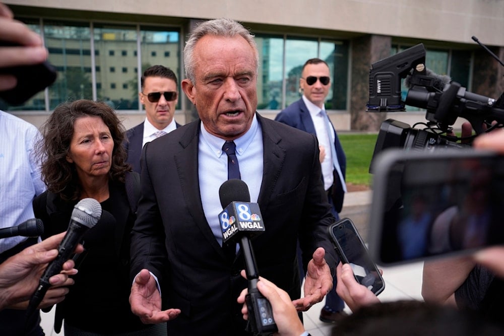 Independent presidential candidate Robert F. Kennedy Jr., speaks to the media near the Pennsylvania Judicial Center, Tuesday, Aug. 20, 2024, in Harrisburg, Pa. (AP Photo/Matt Slocum)