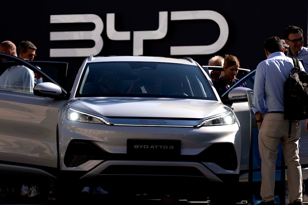 Visitors check the China made BYD ATTO 3 at the IAA motor show in Munich, Germany, on Sept. 8, 2023. (AP)