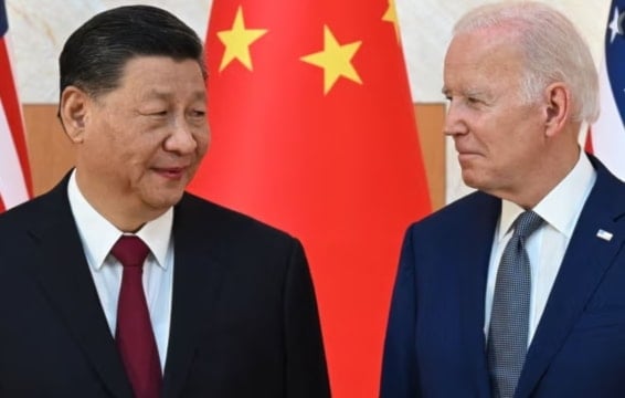 China’s president Xi Jinping and Joe Biden meet at the G20 summit in Bali, Indonesia, on 14 November 2022. (AFP/Getty Images)