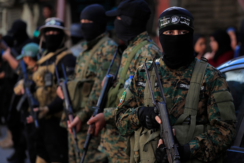 Hamas fighters attend the funeral procession of a Hamas official Samer al-Haj who was killed by an Israeli drone strike, at Ein el-Hilweh Palestinian refugee camp, in the southern port city of Sidon, Lebanon, Saturday, August 10, 2024 (AP)