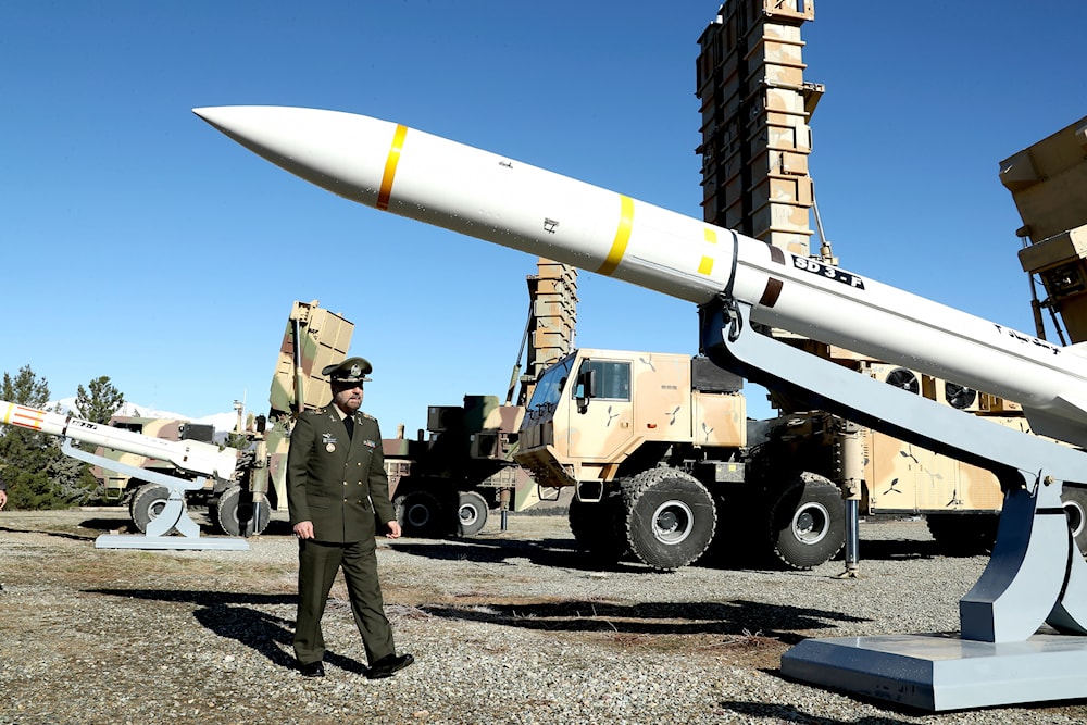 on Saturday, Feb. 17, 2024, Defense Minister Gen. Mohammad Reza Gharaei Ashtiani reviews the domestically built Arman air defense system (Iranian Defense Ministry via AP)