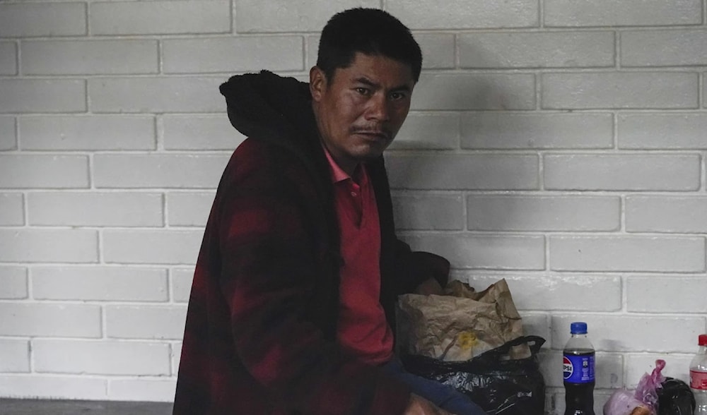 Rigoberto Roman Miranda Orozco, the ringleader of various Guatemalans accused of having smuggled 53 migrants from Mexico and Central America sits in a cell at a courtroom in Guatemala City on August 21, 2024. (AP)