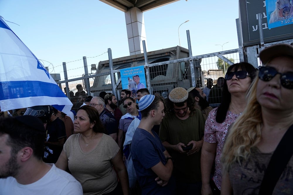 Protesters gather in support of soldiers being questioned for detainee abuse, outside of the Sde Teiman military base, on July 29, 2024. (AP)