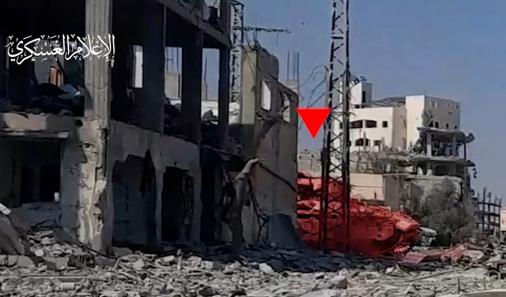 An image screenshot from footage released by the al-Qassam brigades in Rafah, Gaza Strip, on August 21, showing the targeting of an Israeli occupation forces' armored personnel carrier.