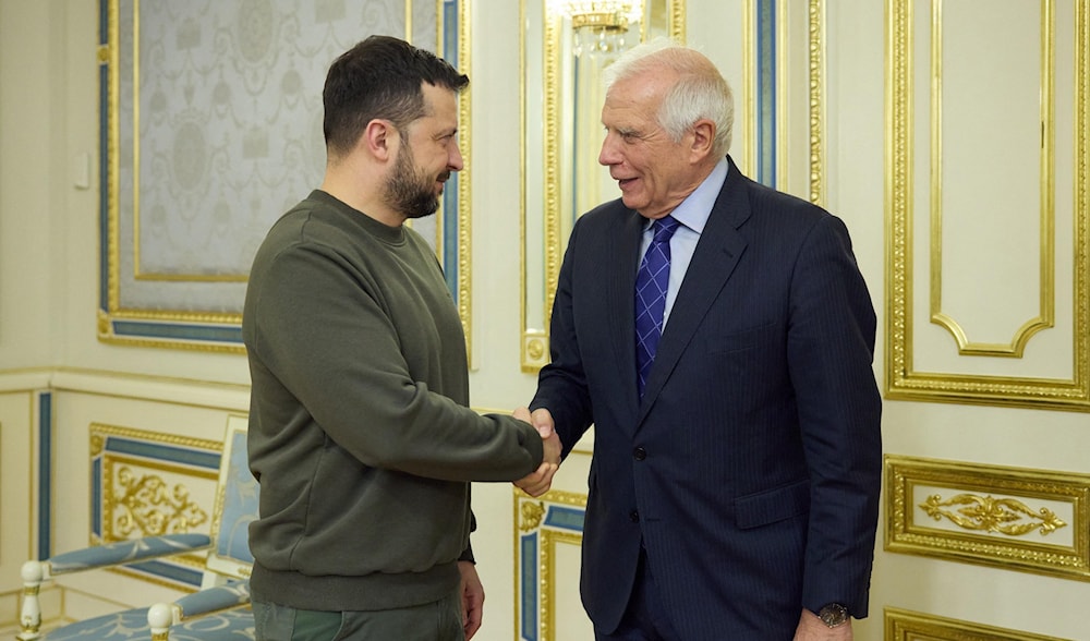 Ukraine's President Volodymyr Zelensky shaking hands with EU's High Representative for Foreign Affairs and Security Policy Josep Borrell prior to their talks in Kiev, February 7, 2024. (AFP)