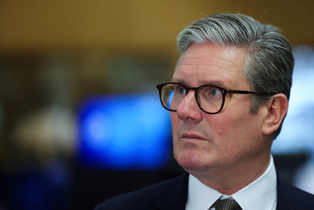 British Prime Minister Keir Starmer looks on at the Metropolitan Police Command and Control Special Operations Room at Lambeth Police Headquarters in London, on August 9, 2024. (AP)