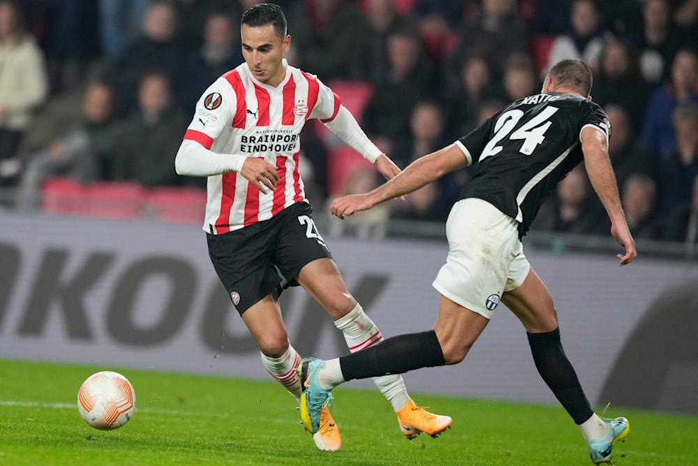 Then-Bundesliga Mainz player Anwar El Ghazi, left, scores his side's fifth goal during the Europa League group A soccer match between PSV and Zurich, Netherlands, on Oct. 13, 2022. (AP)