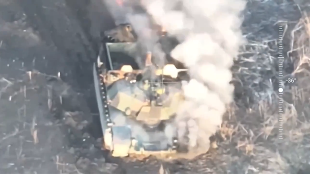 Screengrab from drone footage showing a US-supplied Abrams M1 main battle tank smoking near Berdyshy, Avdiivka direction, Donetsk, March 3, 2024 (Russian military media)